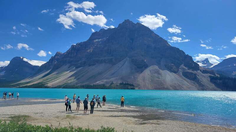 Airport Pickup & Private Tour from Calgary to The Rockies! - Two Jack Lake and Lake Minnewanka bring the best photo opportunity