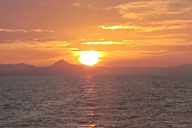 Catamaran ride at sunset from the Port of Denia - Sunset, Cava, and the Mood on Board