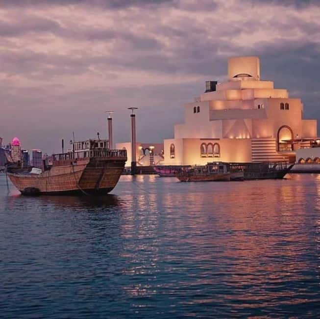 Doha: Desert Safari, ATV/Quad, Camel Ride & Inland Sea Tour - Sandboarding, camel rides, and falcon photographs