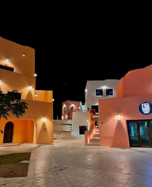 Doha: Doha Night City Tour from Hotel or Airport pickup - The National Museum at night: architecture before exhibits