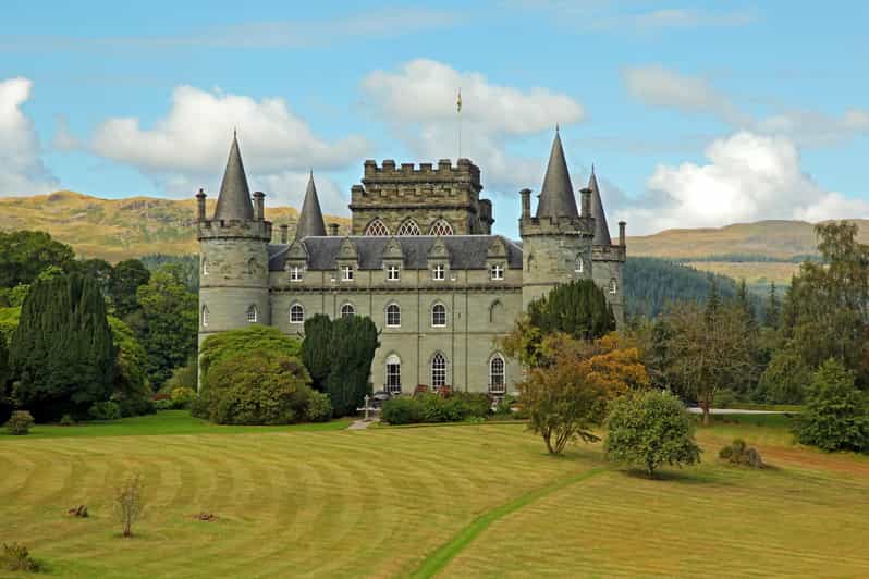 From Greenock Cruise Terminal: West Highland Private Tour - Luss: cottages, a pier, and a Viking stone