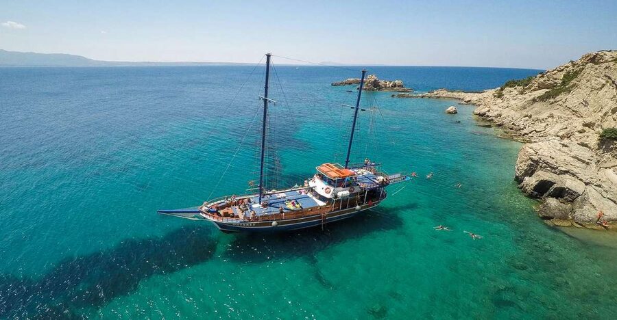 From the Port of Kos: Full Day Boat Cruise to 3 Islands - Plati: turquoise water and a jump from the boat