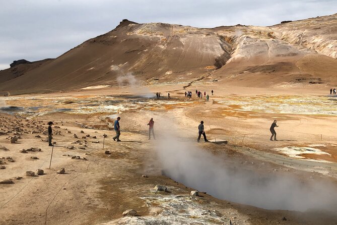 Lake Myvatn Day Tour and Godafoss Waterfall for Cruise Ships from Akureyri Port - Grjótagjá shows the split beneath Iceland