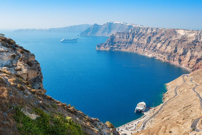 Santorini 8-Hour Private Tour with Hotel & Cruise Port Pickup - The lighthouse reaches Santorini’s quieter edge